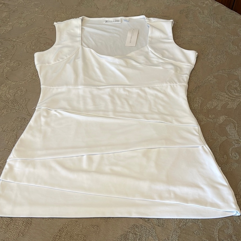 New tag on top size S by New York company